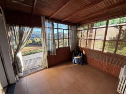 Galería acristalada con vistas al valle — casa de piedra en Cutián, Cerdedo-Cotobade